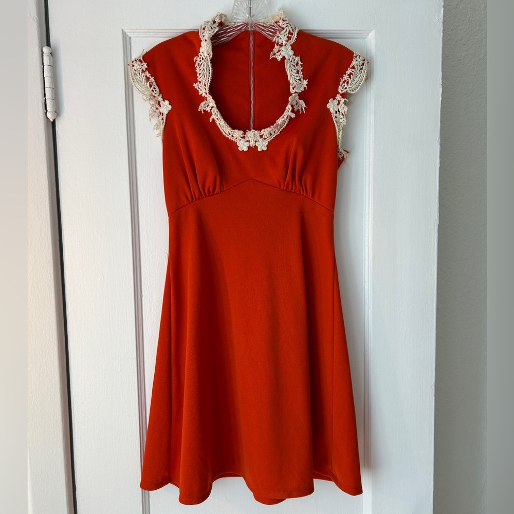 Orange vintage mini dress with white lace trim